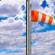 Mostly Cloudy then Decreasing Clouds and Breezy